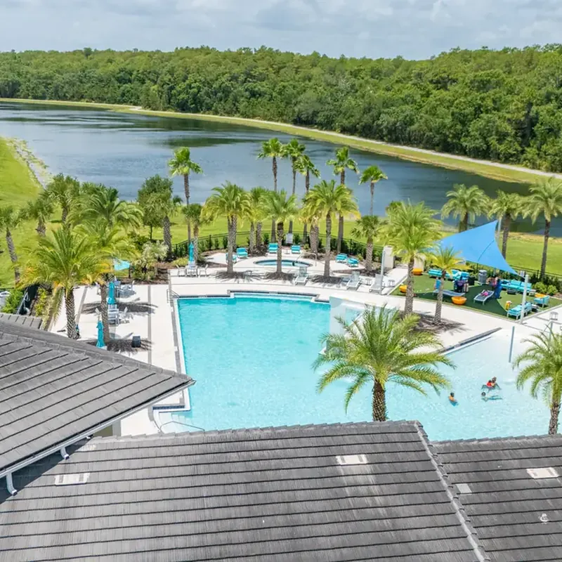 Aerial view of resort pool and lake
